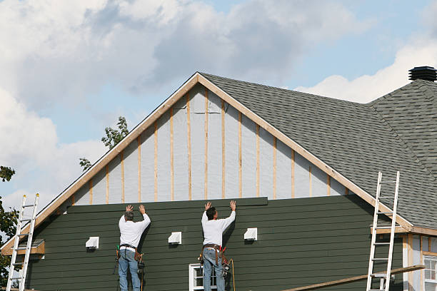 Professional Siding Installation technician working in Long Beach, NY